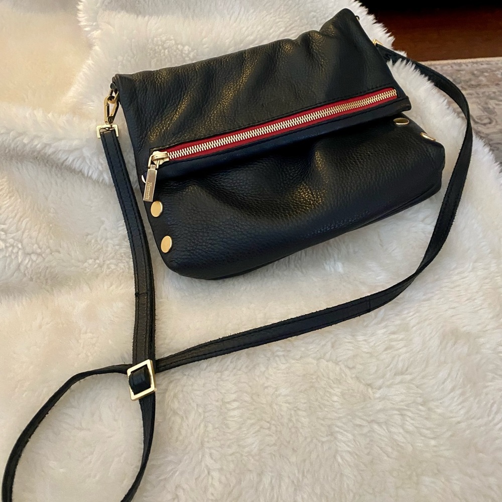Hammitt VIP Medium Clutch- slightly used- Black with red trim and gold accents.